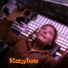 Kaylee Kaylee from "Firefly" lies flat on her back as she works on Serenity
